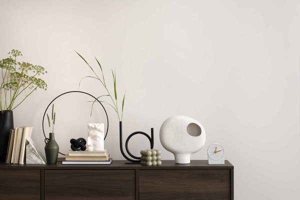 Quelles boucles d'oreilles choisir pour accompagner une coiffure tressée sophistiquée?